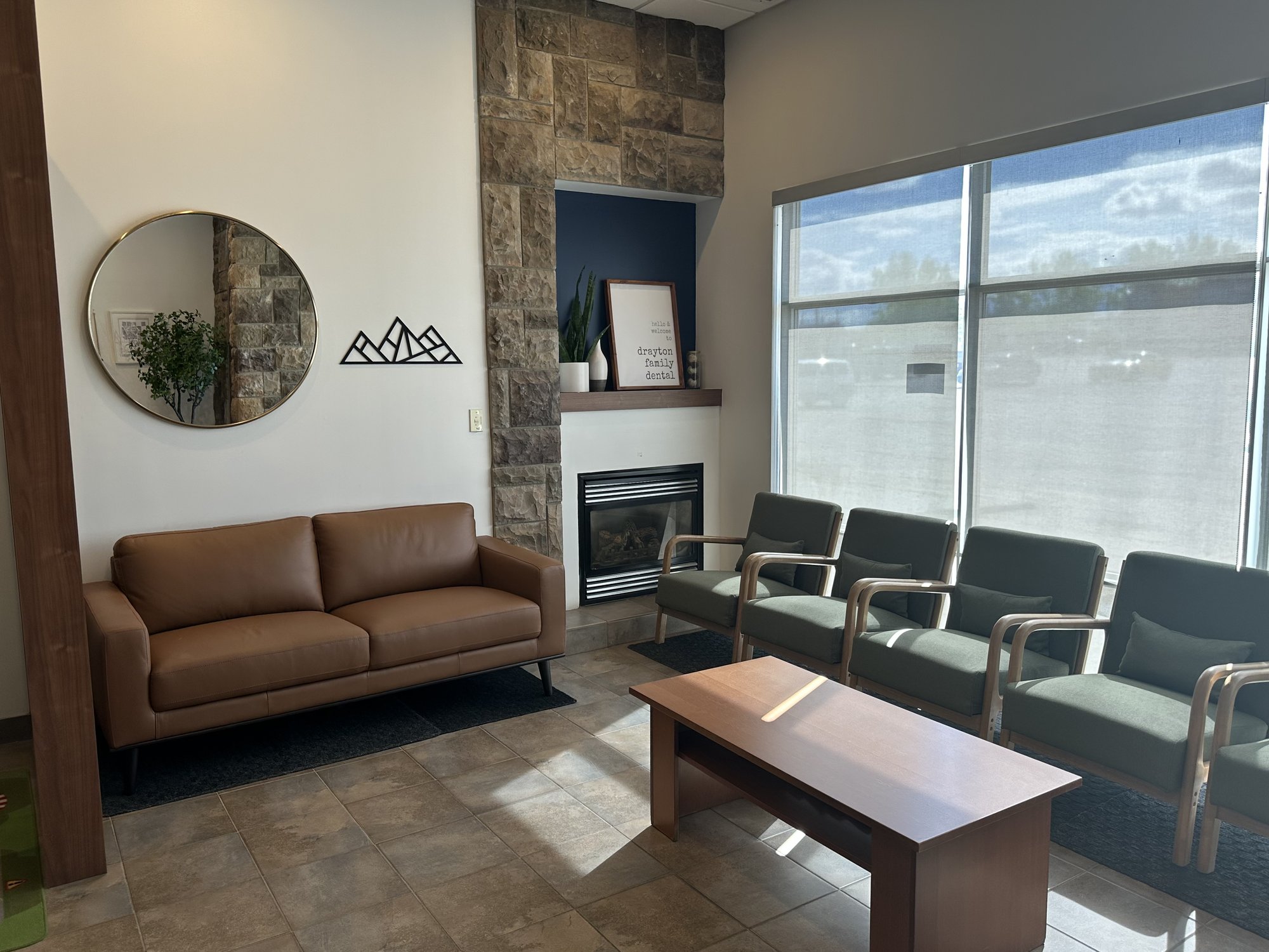 Drayton Family Dental — waiting room with fireplace